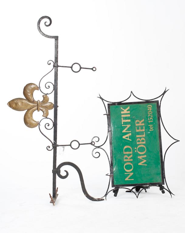 AFFÄRSSKYLT, järn, tidigt 1900-tal.