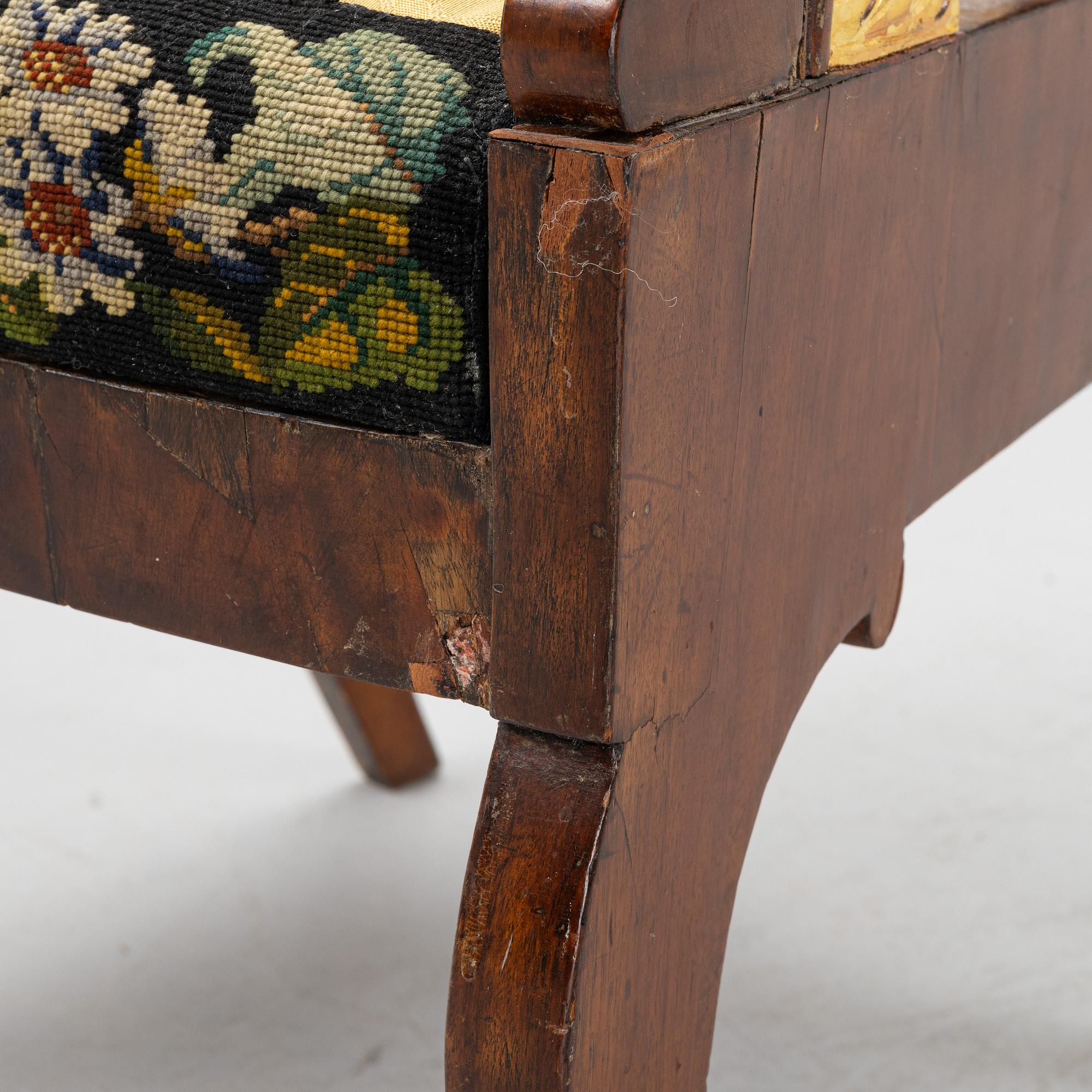 A Russian/Baltic Empire mahogany armchair, first part of the 19th century.
