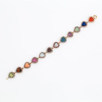 ARMBAND med olika färgstenar samt rosen- och gammalslipade diamanter.