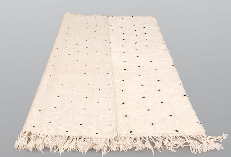 A Moroccan carpet, 254 x 160 cm.