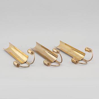 Three wall candle holders from Skultuna, model "Reflex", second half of the 20th century.