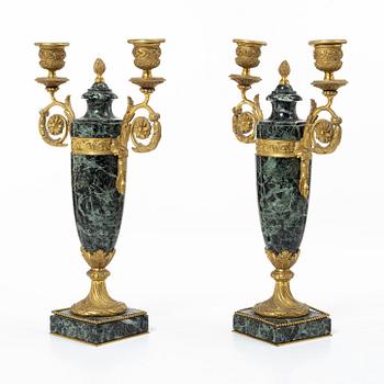 A pair of candelabras, around 1900.
