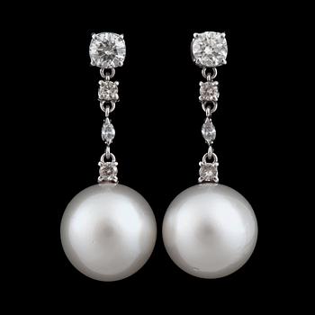 955. A pair of cultured South sea pearl and circa 1.90 cts diamond earrings.
