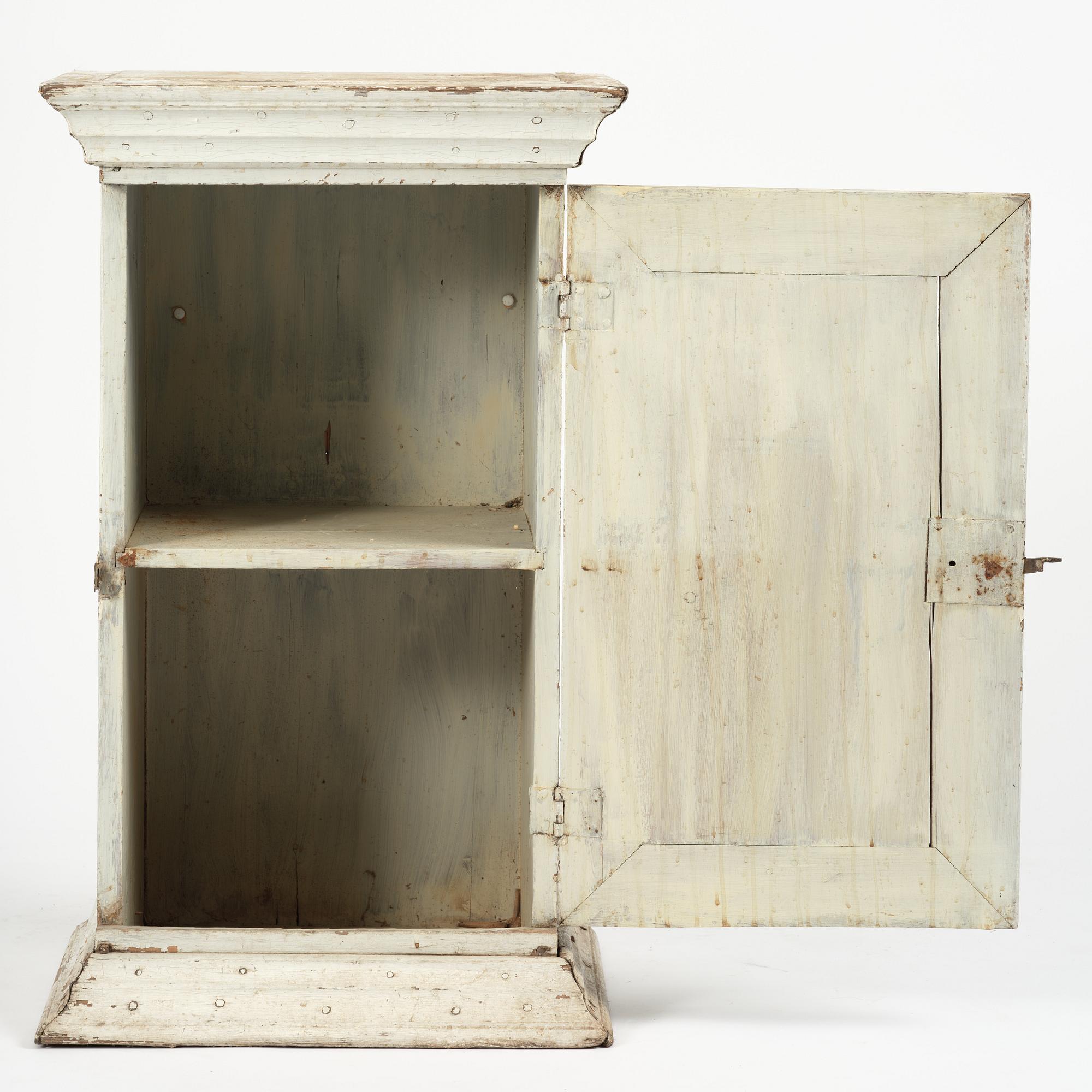 A Gustavian column-shaped cabinet, circa 1800.