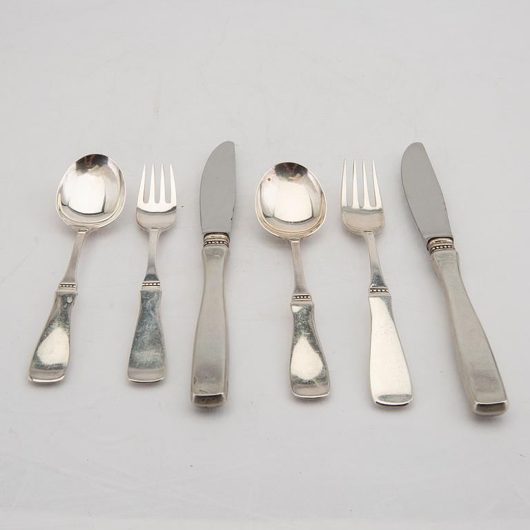 A Swedish 20th century set of 23 pcs of silver cutlery mark of E Löfman Linköping 1971 total weight 936 grams.