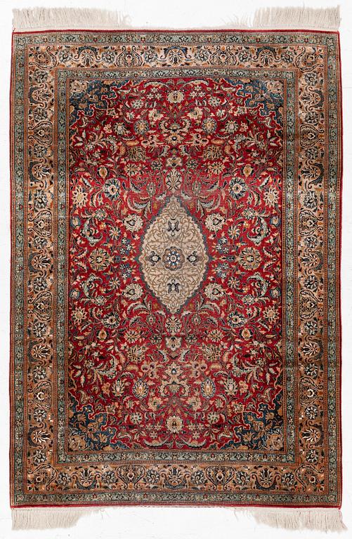 A silk Kashmir rug, c. 176 x 121 cm.