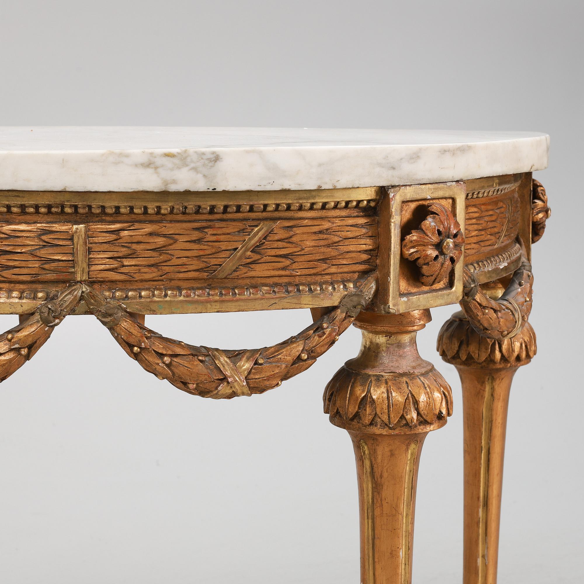 A Gustavian giltwood and marble console table, late 18th century.