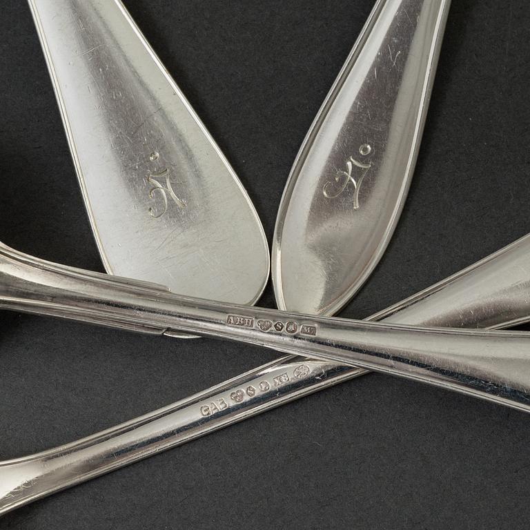 12 20th century silver spoons and 10 forks by GAB and Bernhard Hertz, Stockholm.