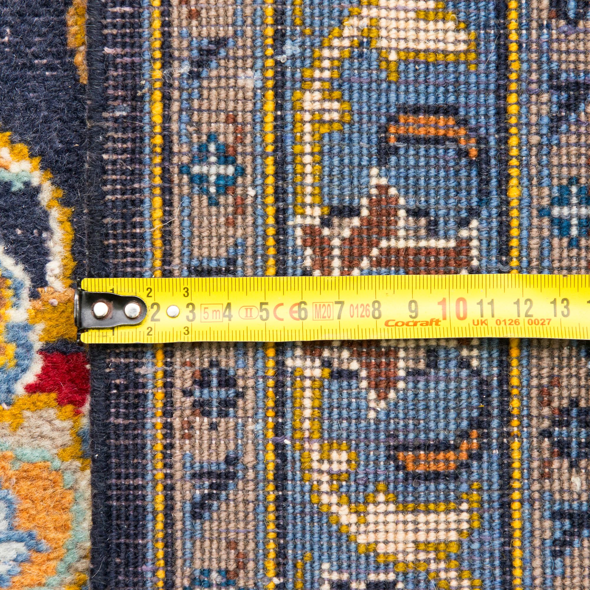A Keshan carpet, ca 404 x 297 cm.