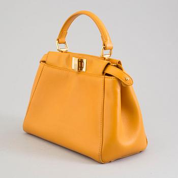 a Fendi 'Peekaboo' bag.