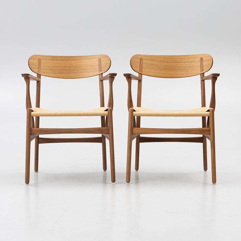 Hans J. Wegner, a pair of CH26 armchairs, Carl Hansen & Son, Denmark, samtida tillverkning.