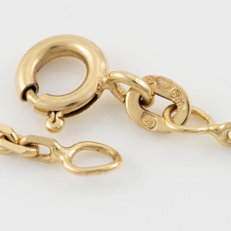 Hänge med kedja 14K guld med en fasettslipad akvamarin och runda briljantslipade diamanter.