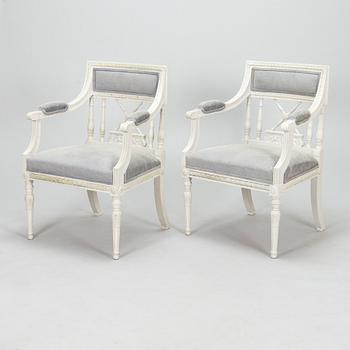 A pair of late gustavian style armchairs, early 20th century.