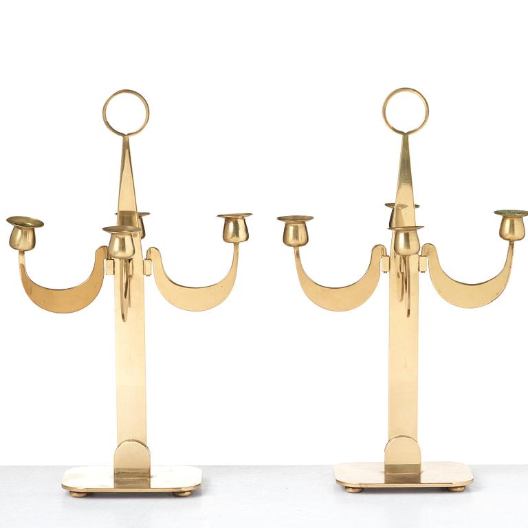 Josef Frank, a pair of brass candelabra by Svenskt Tenn, Sweden 1950's, model nr 2663.