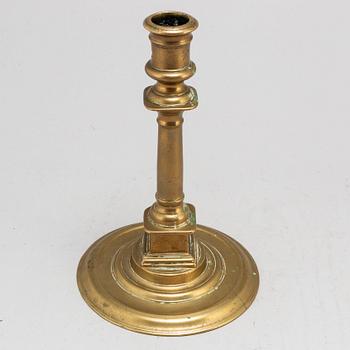 A French late 16th century bronze candlestick.