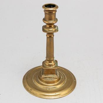 A French late 16th century bronze candlestick.