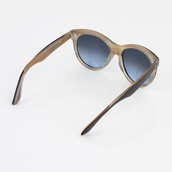 Oliver Goldsmith, a pair of "Manhattan" sunglasses.