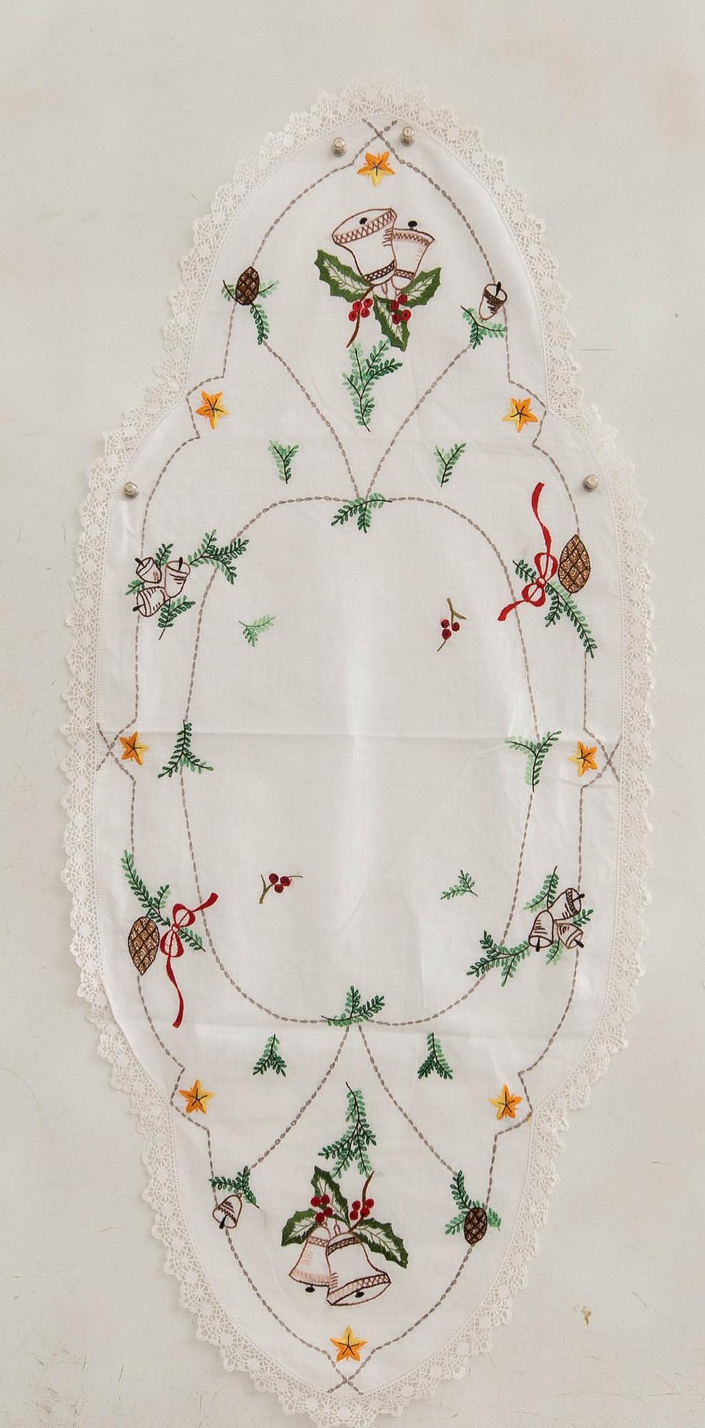 A collection of smaller Christmas tablecloths, runners, and wall hangings, approximately 34 pieces, mid/second half of the 20th century.
