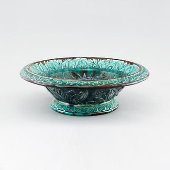 A majolica bowl by Rörstrand, dated 1872.