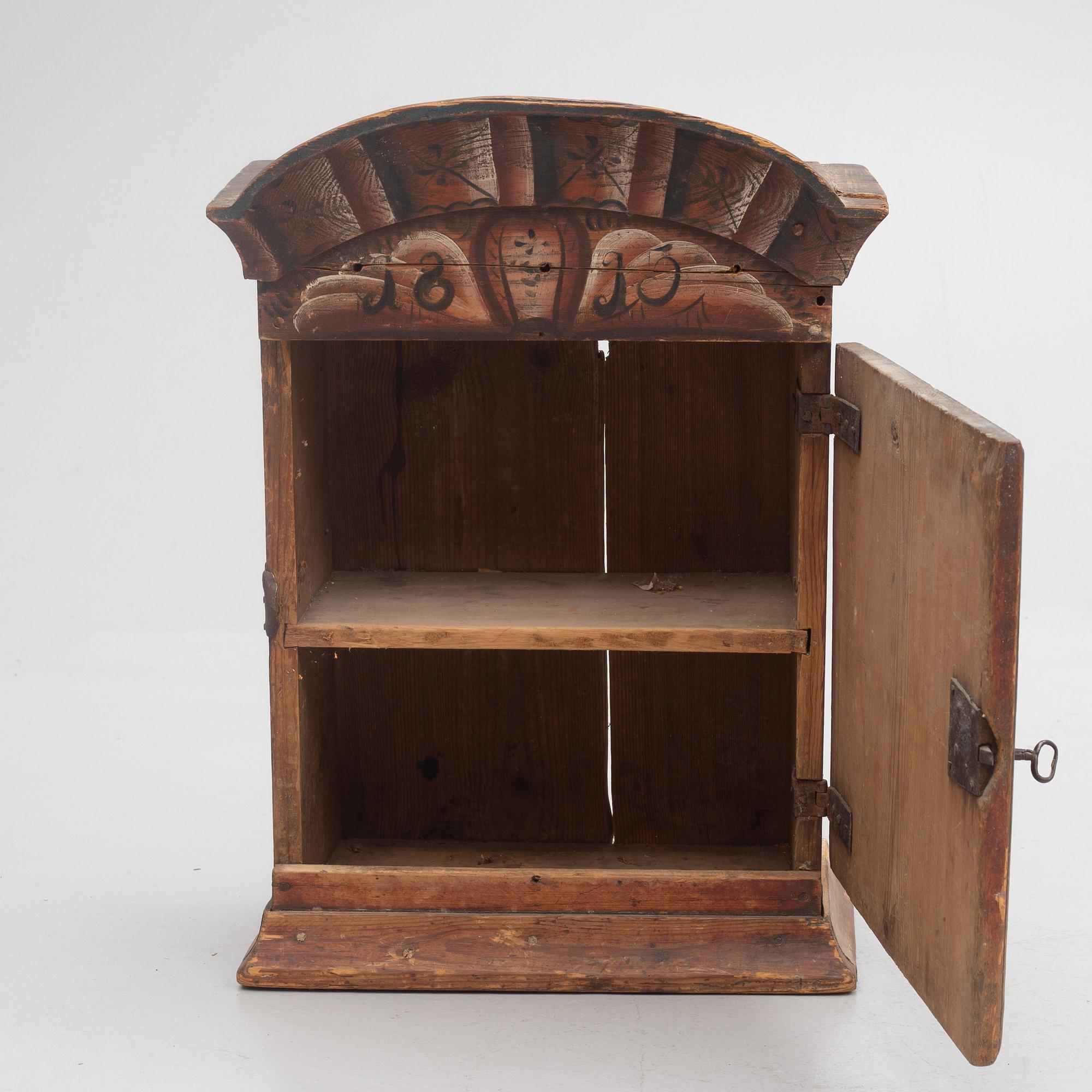 A Swedish wall cabinet, Rättvik, Dalarna, dated 1815.
