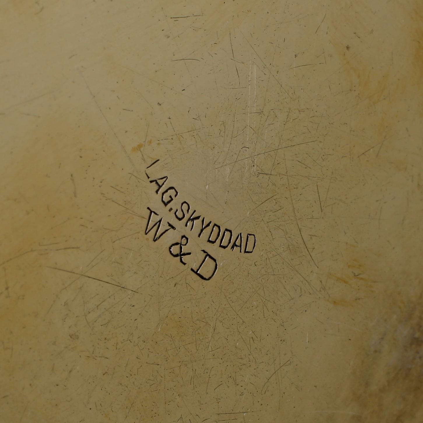 MANSCHETTKNAPPSASK, "Originell", Widerholm och Dahlberg, Eskilstuna, 1920-/30-tal.