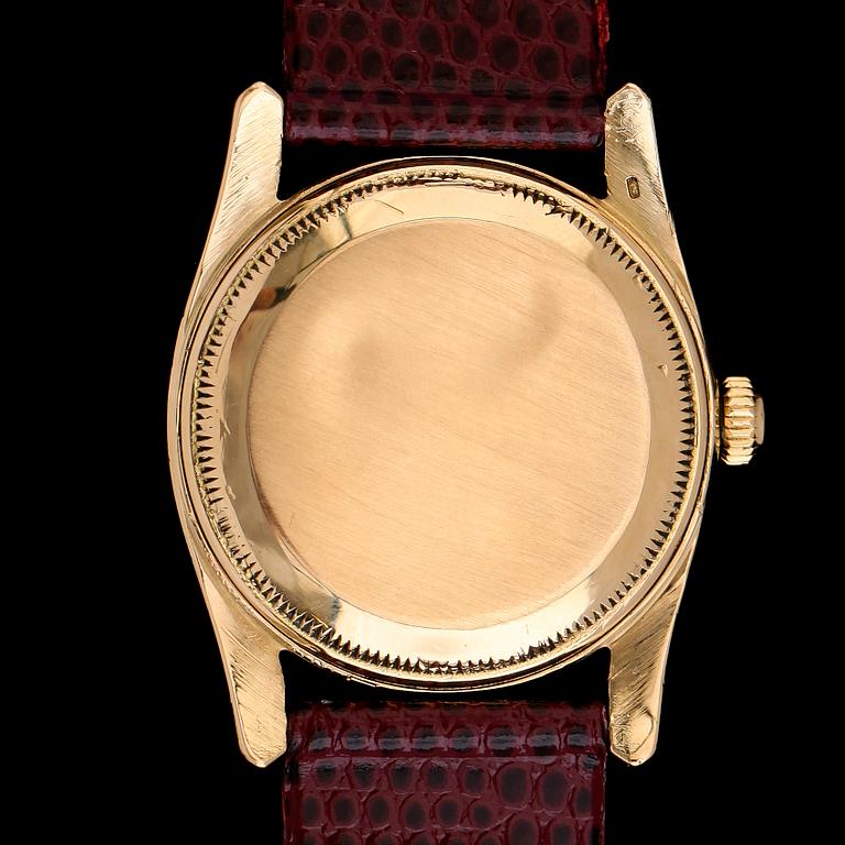 ARMBANDSUR, 18 k guld, Rolex Oyster Perpetual, Bombay 6590, 1900-talets mitt.