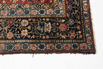 A Bakhtiari carpet, signed, c. 580 x 212 cm.