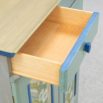 A 'Vita blommorna' cabinet/sideboard, painted by Liselott Malmsten, Firma Carl Malmsten, 1991.