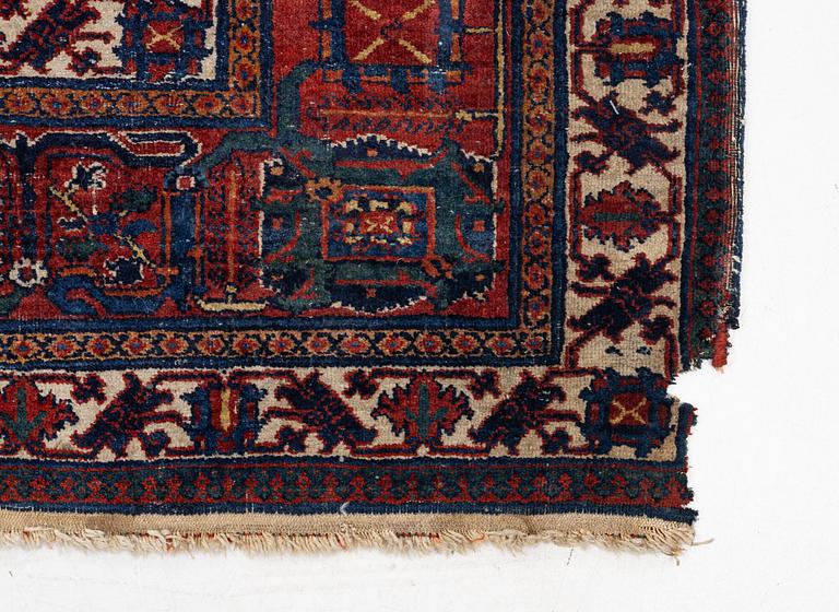An oriental carpet, c. 360 x 270 cm.