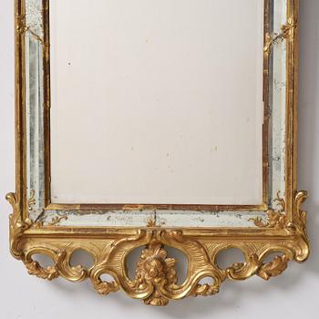 A rococo giltwood mirror, Stockholm, later part 18th century.