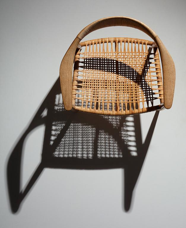 Hans J. Wegner, an oak and rattan 'The Chair', JH501, Johannes Hansen, Denmark.