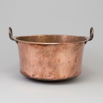 A 19th century copper cauldron.