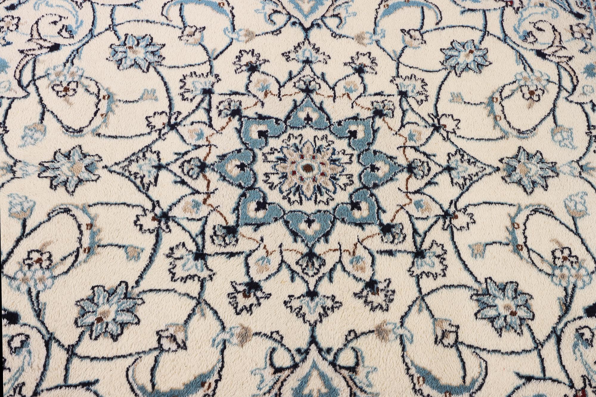 A Nain crug, part silk, c. 200 x 193 cm.