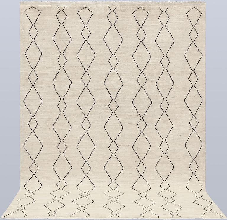 A Moroccan rug, approx. 292 x 203 cm.