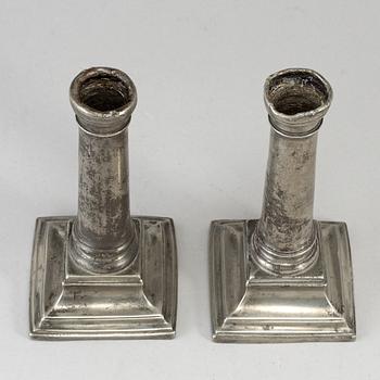 A pair of 18th century pewter candlesticks, London.