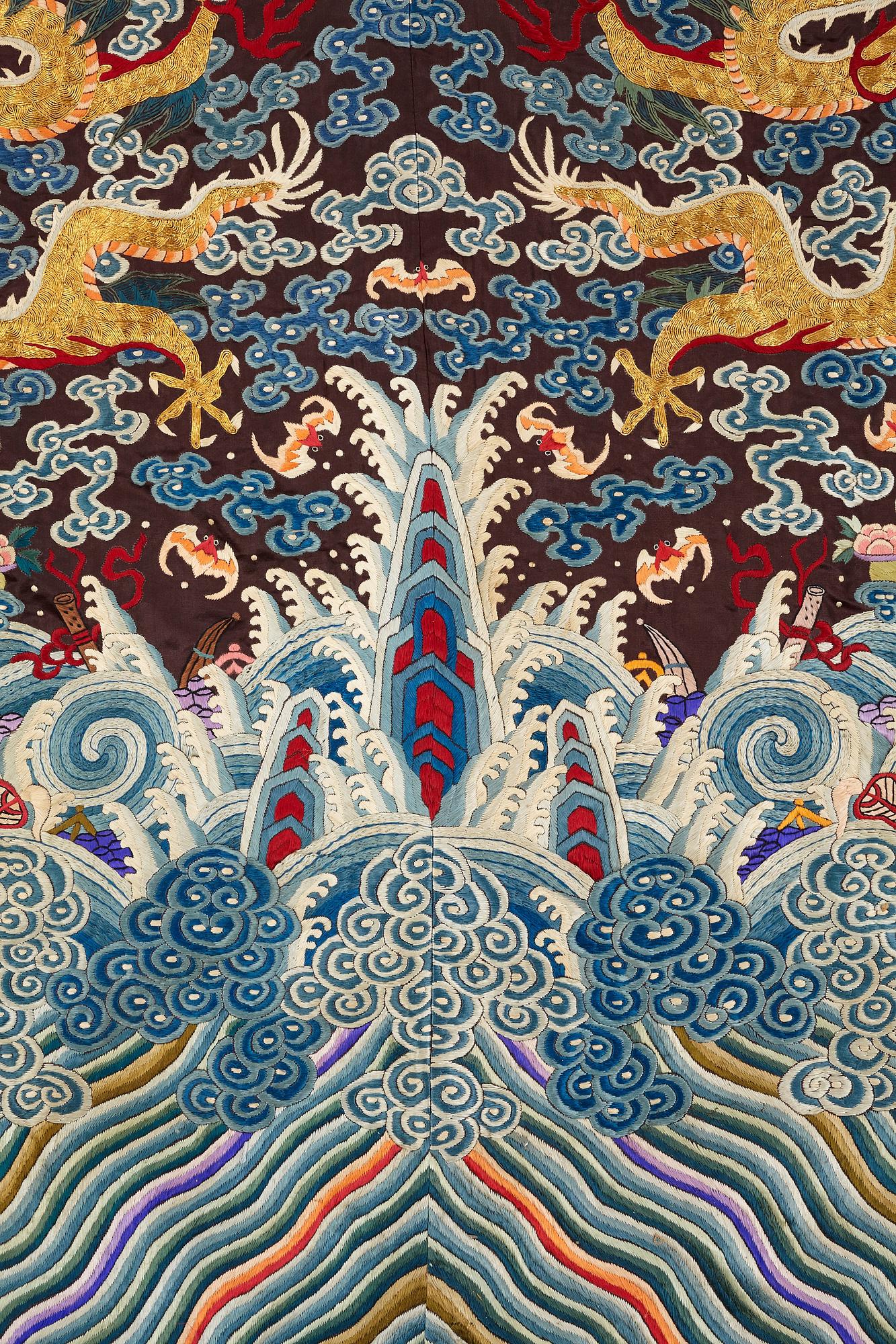 A Chinese embroidered silk robe, late Qing dynasty, circa 1900.