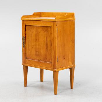 A Gustavian style bedside table, around the year 1900.