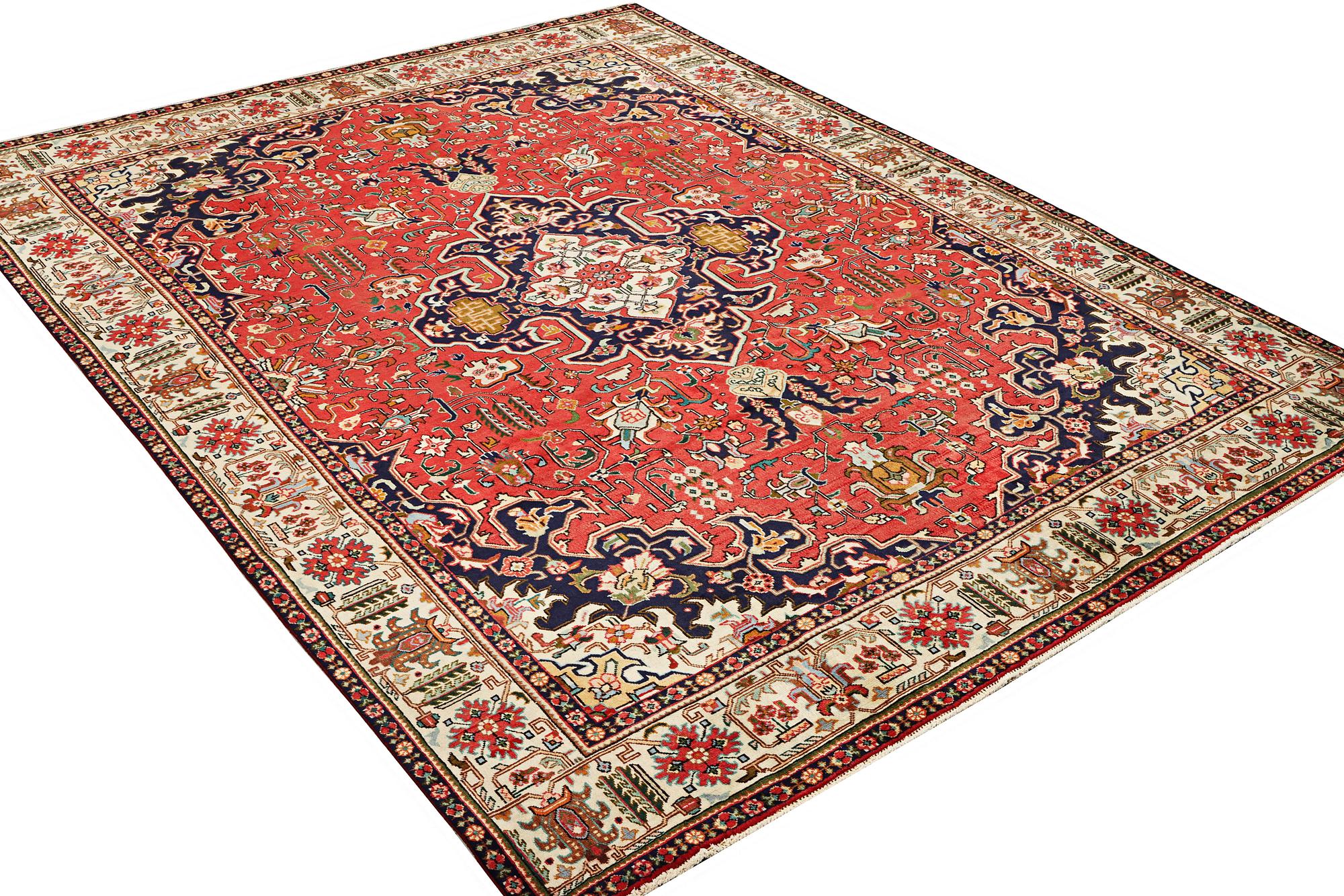 A Tabriz carpet, c. 335 x 257 cm.