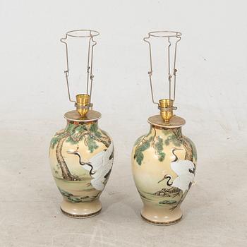 A pair of early 1900s Japanese porcelain table lamps.
