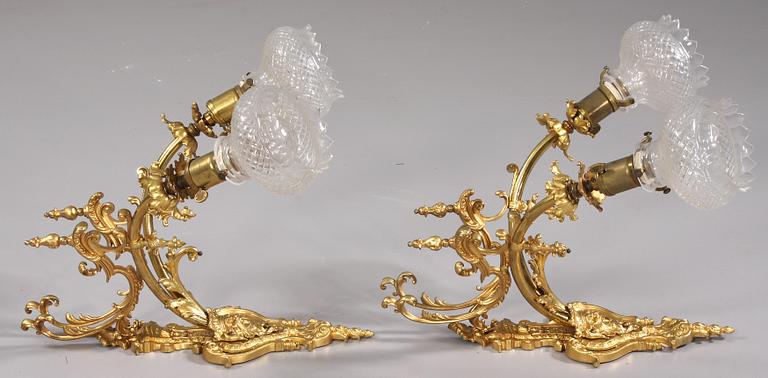 VÄGGLAMPETTER, ett par, Louis XV-stil, 1900-tal.