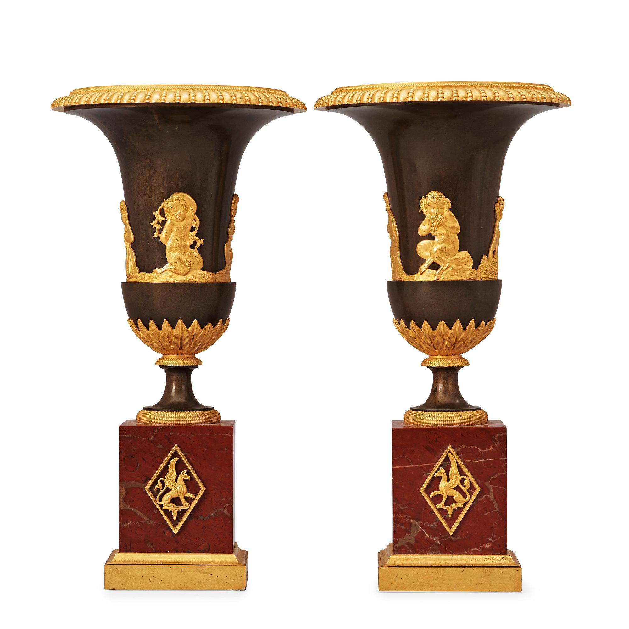 A pair of French Empire early 19th century urns.