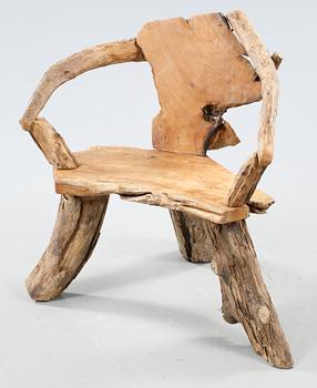 A wooden armchair, modern made.