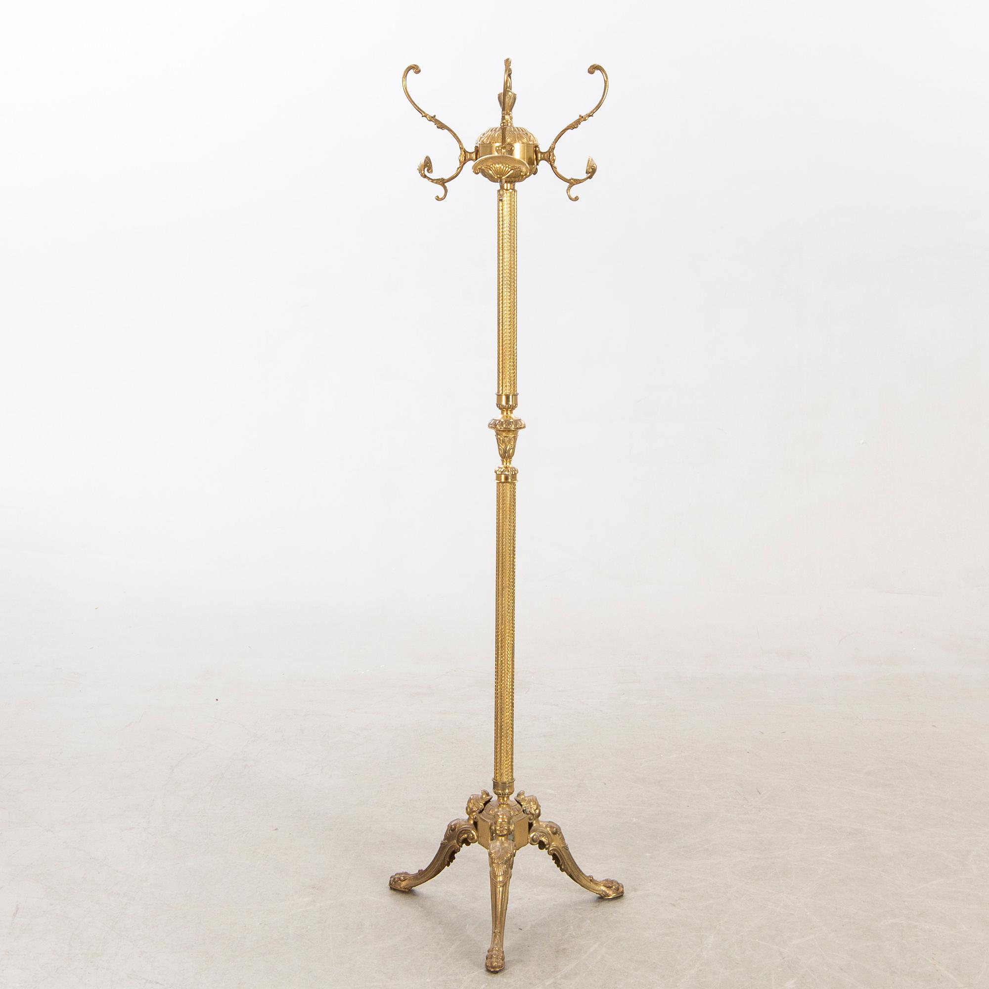 A brass coat hanger alter part of the 20th century.