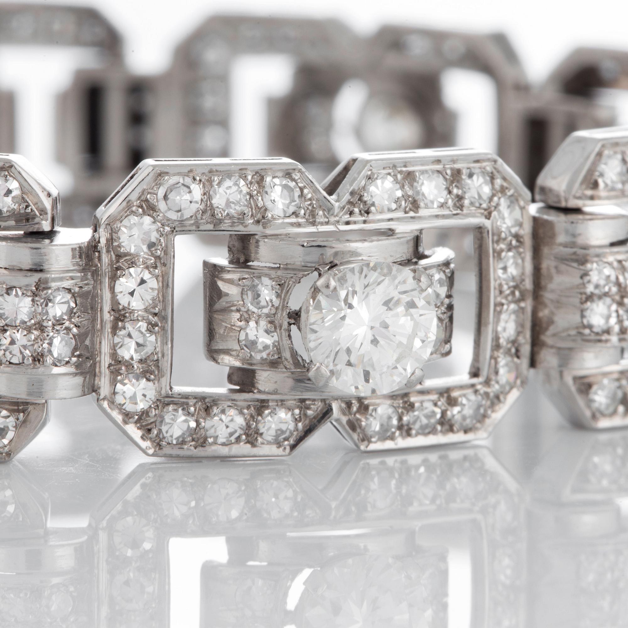 A platinum bracelet set with round brilliant- and eight-cut diamonds.