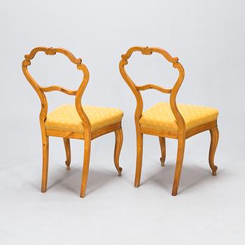A pair of rococo revival chairs. Latter part of 19th century.