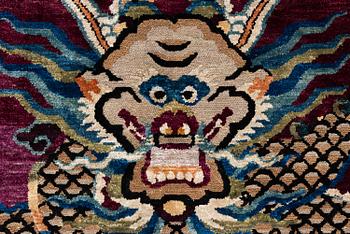 A Chinese silk and metal-thread 'Dragon' pillar rug, Bejing, North China, around 1910, c. 234x151 cm.