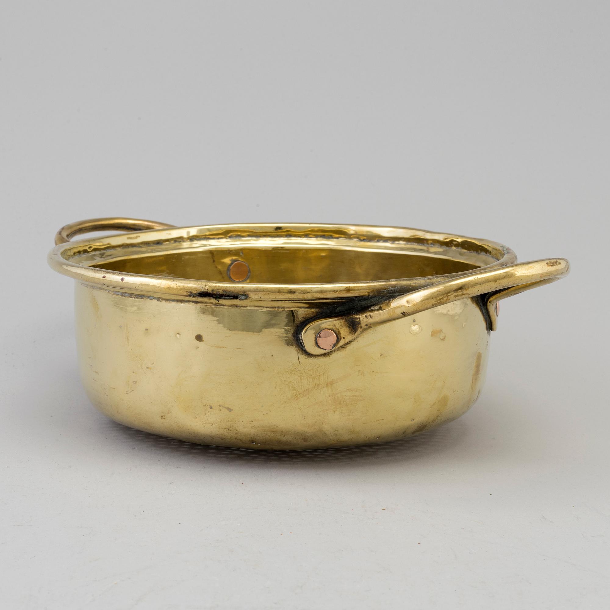 An 18th century brass colander.