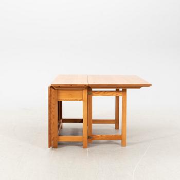 A mid 20th century/second part pine folding table.