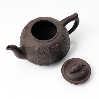 Bao Zhenglan, A brown yixing 'zodiac' teapot, China, 1990s.