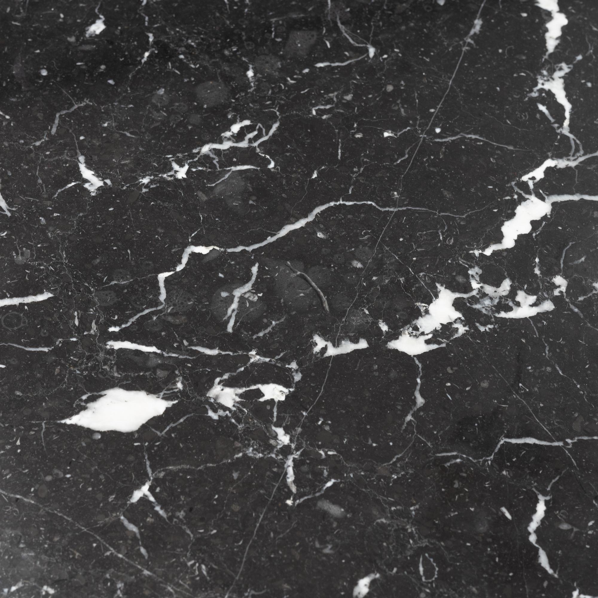 Louise Roe, a 'Roundabout' dining table with marble top.